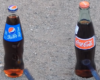 Feu contre bouteilles de Coca-cola et Pepsi. Qui explose ?