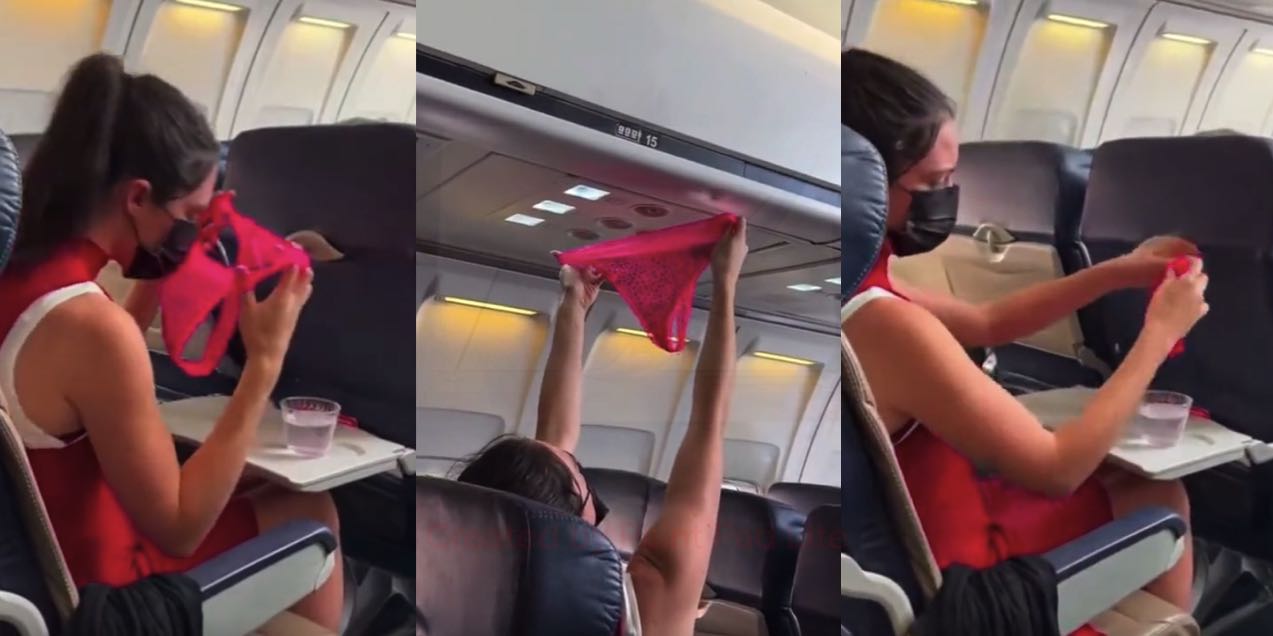 Une fille lave et sèche sa culotte dans l'avion